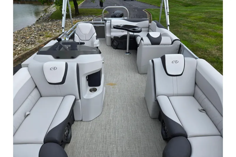 Slide: The Image of 2024 Avalon LSZ Cruise Bench pontoon boat with luxurious seating and modern design. - 10