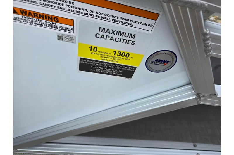 Slide: The Image of 2024 Avalon LSZ Cruise Bench capacity label, warning signs, and certification sticker. - 19