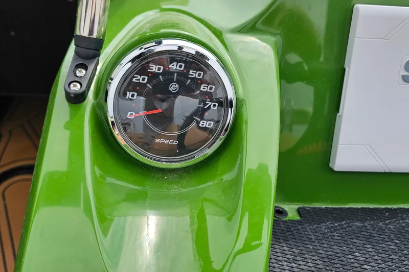 Slide: The Image of Speedometer on green 2025 Heyday WTSurf boat dashboard. - 10