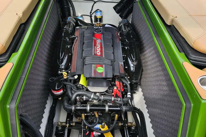 Slide: The Image of 2025 Heyday WTSurf boat engine, featuring a powerful 6200 model, surrounded by green and beige interior. - 16