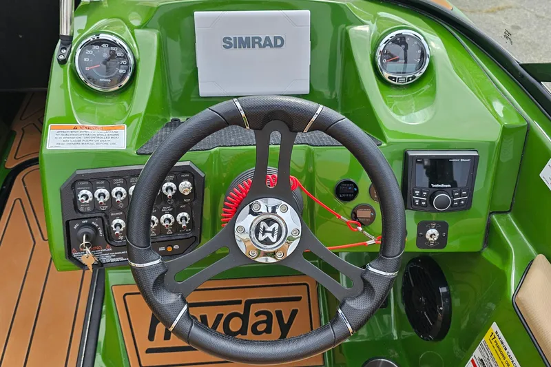 Slide: The Image of 2025 Heyday WTSurf boat dashboard with steering wheel and control panel. - 8