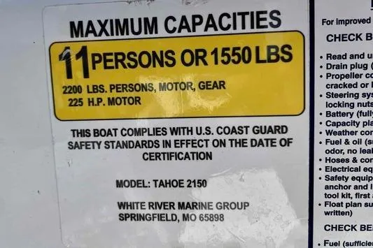 Slide: The Image of Maximum capacity label for 2023 Tahoe 2150 boat, 11 persons or 1550 lbs. - 8