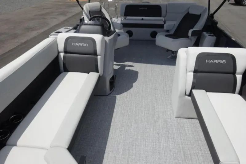 Slide: The Image of 2026 Harris Cruiser 230 Heritage Edition pontoon boat interior with luxurious seating. - 12