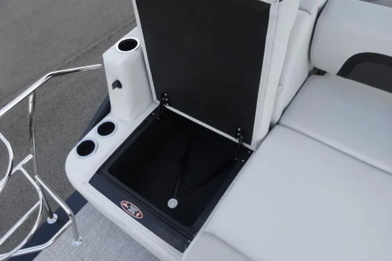 Slide: The Image of 2026 Harris Cruiser 230 Heritage Edition boat seat storage with cup holders. - 15