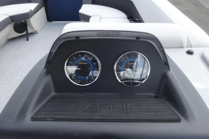 Slide: The Image of Dashboard of 2026 Harris Cruiser 230 Heritage Edition with dual gauges. - 7