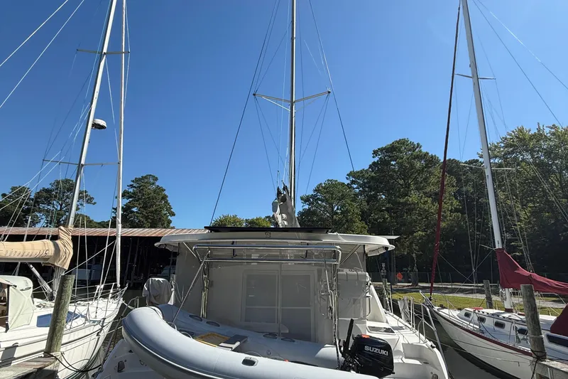 Slide: The Image of 2010 Leopard 38 catamaran docked at marina with clear blue sky. - 10