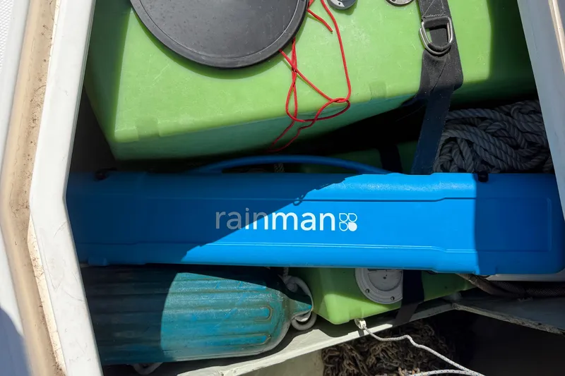 Slide: The Image of Storage compartment on 2010 Leopard 38 with Rainman watermaker and marine equipment. - 36