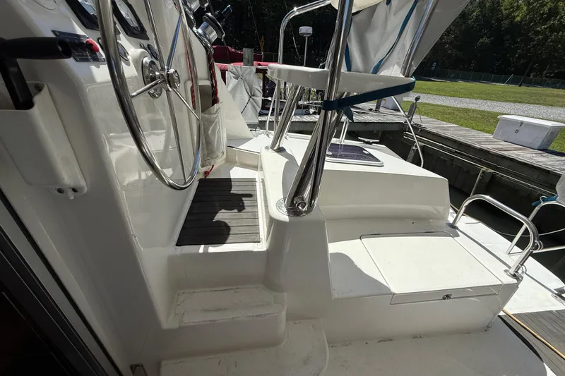 Slide: The Image of 2010 Leopard 38 yacht cockpit with steering wheel and seating area. - 51