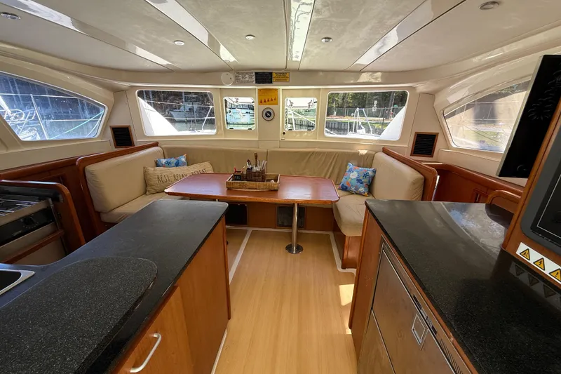 Slide: The Image of Interior of 2010 Leopard 38 yacht with cozy seating and modern kitchen area. - 54