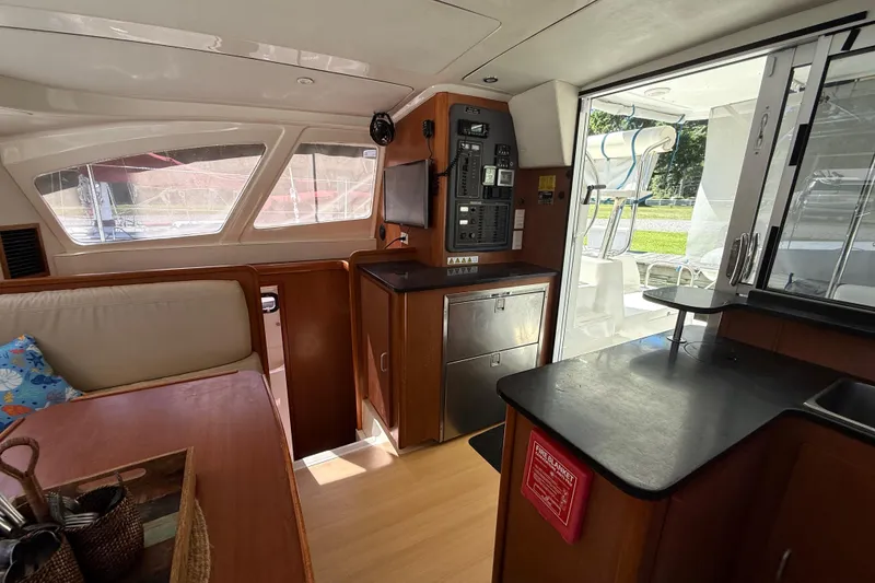 Slide: The Image of Interior of 2010 Leopard 38 yacht with modern kitchen and seating area. - 55