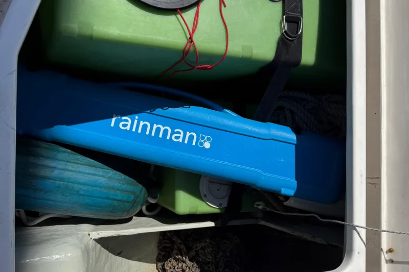 Slide: The Image of Storage compartment on a 2010 Leopard 38 with Rainman watermaker equipment. - 80