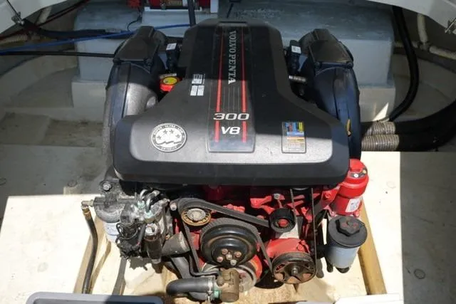 Slide: The Image of 2015 Chris-Craft Capri 21 engine, Volvo Penta 300 V8, in boat compartment. - 12