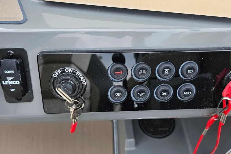 Slide: The Image of Control panel of 2025 Heyday H20 boat with ignition keys and switches. - 10