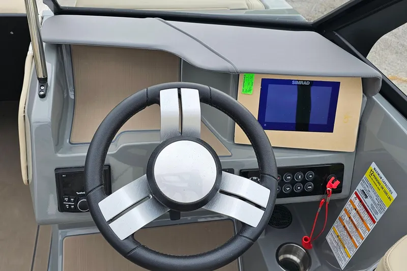 Slide: The Image of 2025 Heyday H20 boat dashboard with steering wheel and digital display. - 7