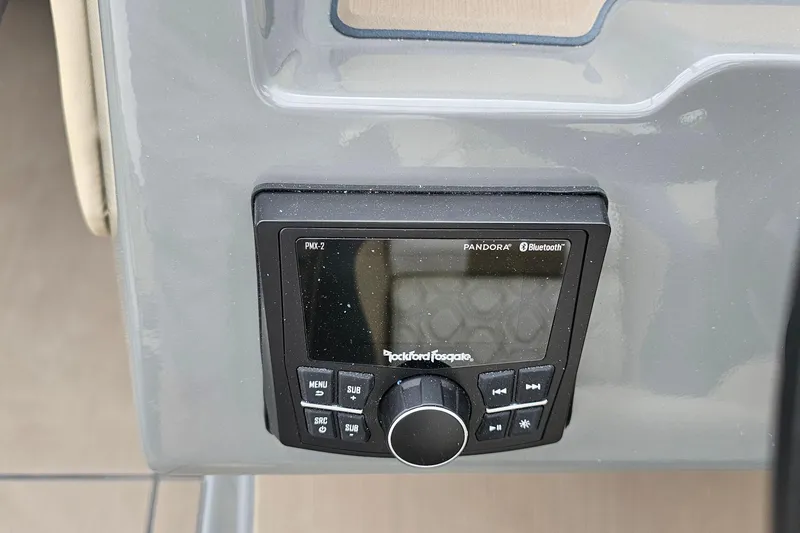 Slide: The Image of Rockford Fosgate PMX-2 audio system in 2025 Heyday H20 boat dashboard. - 8