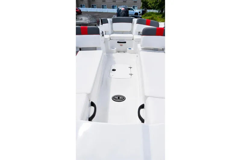 Slide: The Image of 2026 Tahoe T18 boat interior with white seating and modern design. - 4
