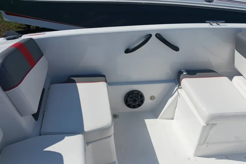 Slide: The Image of Interior seating of 2026 Tahoe T18 boat with white and gray upholstery. - 8