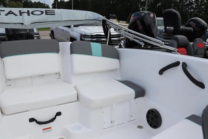 Slide: The Image of 2026 Tahoe T16 boat interior with cushioned seating and modern design elements. - 7