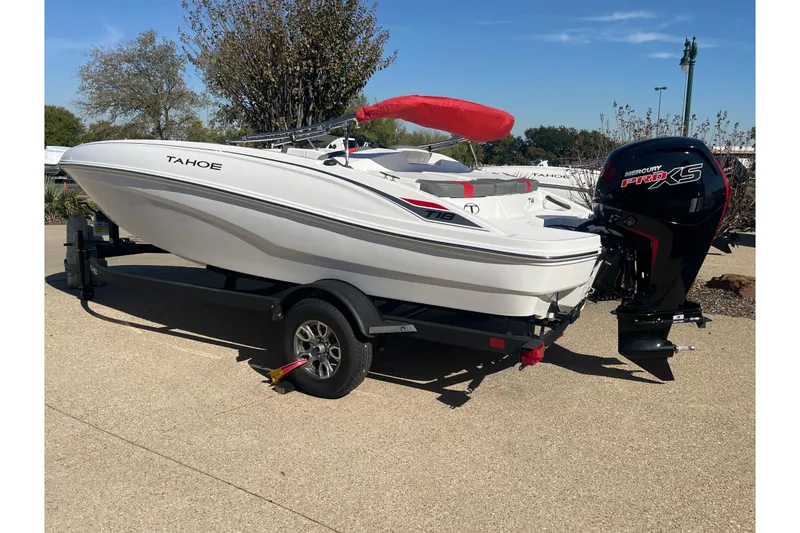 Slide: The Image of 2026 Tahoe T18 boat with Mercury Pro XS engine on a trailer. - 62