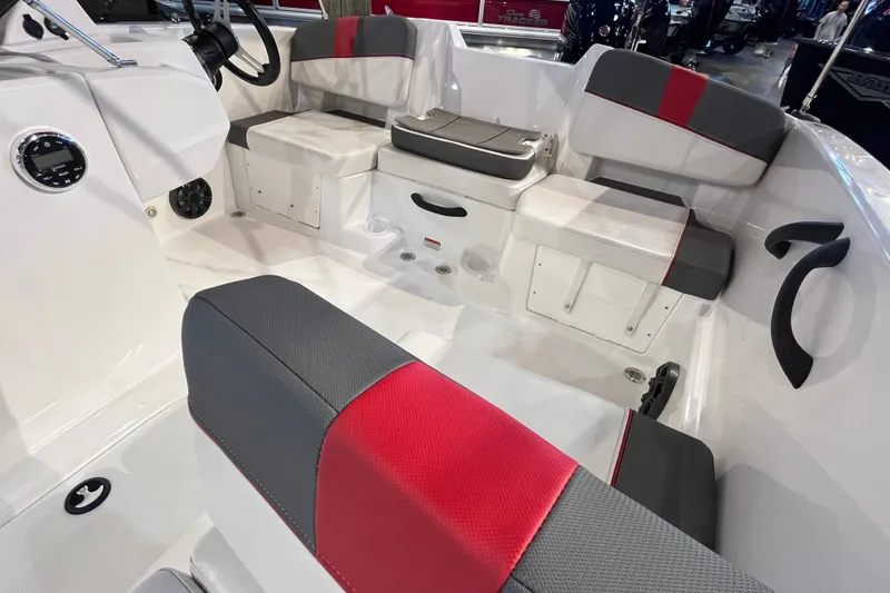 Slide: The Image of Interior of 2026 Tahoe T18 boat with gray and red seating. - 11