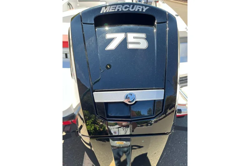 Slide: The Image of Mercury 75 outboard motor on 2026 Tahoe T16 boat, close-up view. - 3