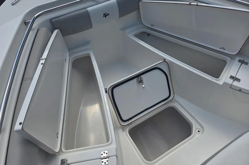Slide: The Image of 2018 Sea Pro 219 Center Console boat storage compartments, open and spacious design. - 22