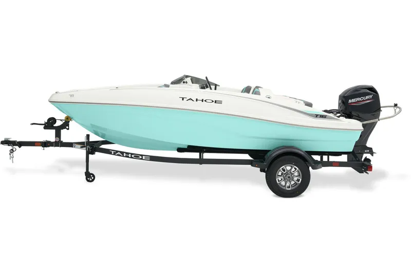 Slide: The Image of 2026 Tahoe T16 boat with Mercury engine on trailer, parked outside a building. - 1