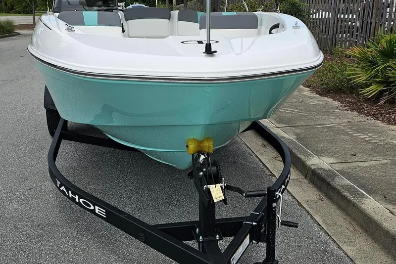 Slide: The Image of 2026 Tahoe T18 boat with canopy and Mercury Pro XS engine on trailer. - 5