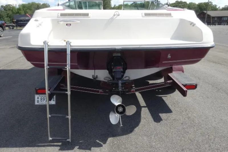 Slide: The Image of Rear view of a 1995 Caravelle 206 boat with ladder and propeller. - 5