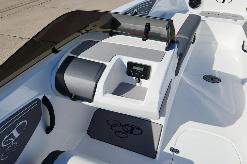 Slide: The Image of 2026 Tahoe T21 boat interior with sleek dashboard and modern seating design. - 11