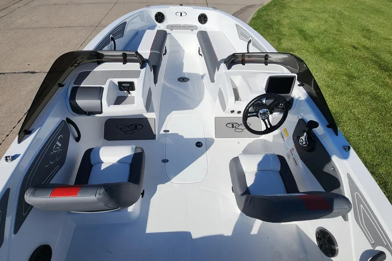 Slide: The Image of 2026 Tahoe T21 boat interior with modern seating and steering wheel design. - 8