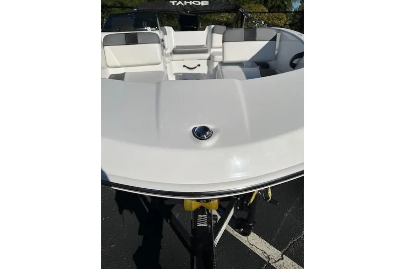 Slide: The Image of 2026 Tahoe T16 boat interior with white seating and sleek design. - 3