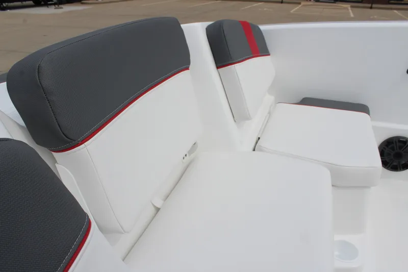 Slide: The Image of 2026 Tahoe T16 boat interior with gray and white seating, red accents. - 13