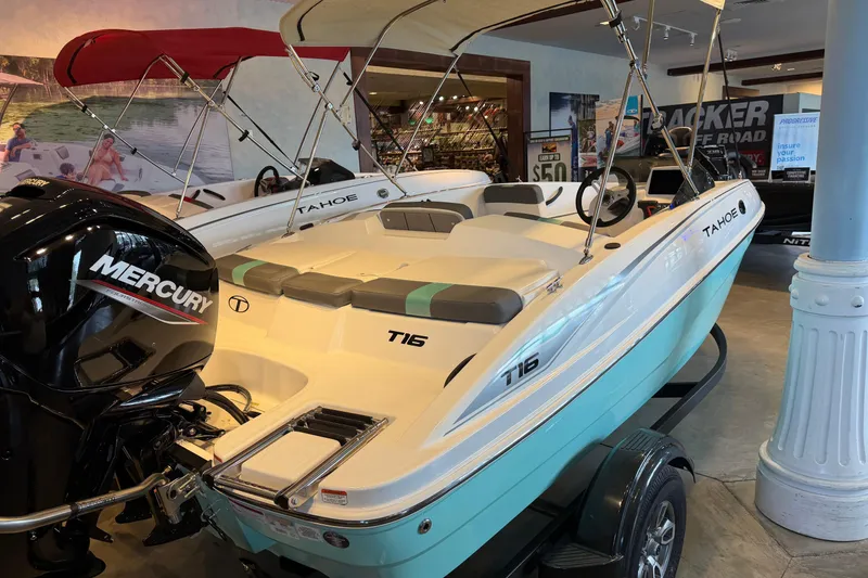 The Image of 2026 Tahoe T16 boat with Mercury engine displayed in showroom. - 0
