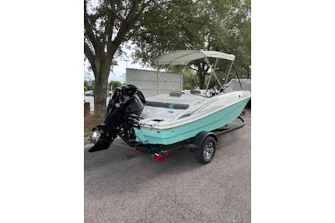 Slide: The Image of 2026 Tahoe T16 boat with canopy and outboard motor on a trailer. - 3