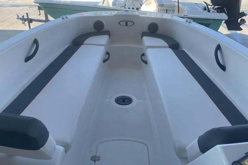 Slide: The Image of 2026 Tahoe T18 boat interior with cushioned seating and sleek design. - 8