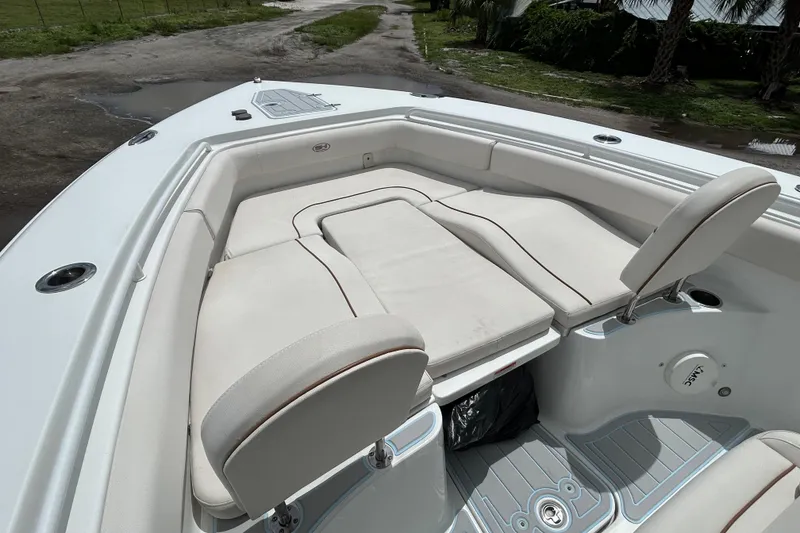 Slide: The Image of 2020 Sea Hunt Ultra 275 SE boat with spacious seating and sleek design. - 11