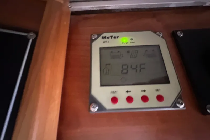 Slide: The Image of Temperature display showing 84°F inside a 2020 Cutwater C-28 boat. - 37
