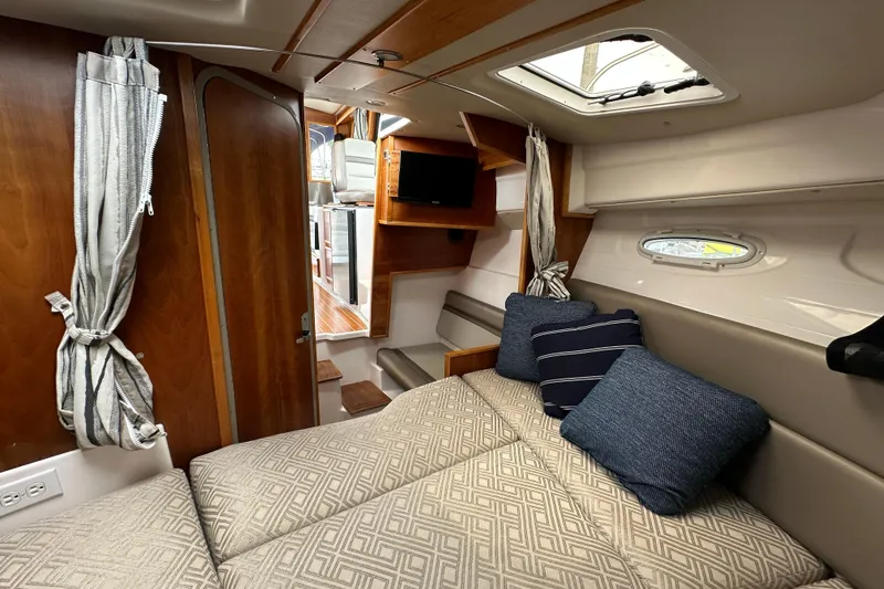 Slide: The Image of Interior of 2020 Cutwater C-28 boat with cozy seating and modern design. - 40