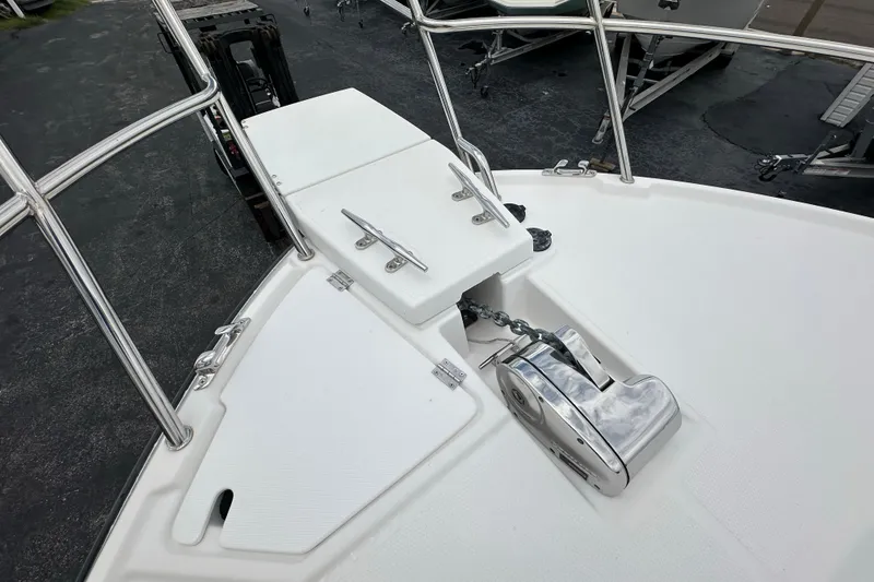 Slide: The Image of 2020 Cutwater C-28 boat deck with anchor winch and stainless steel fittings. - 45