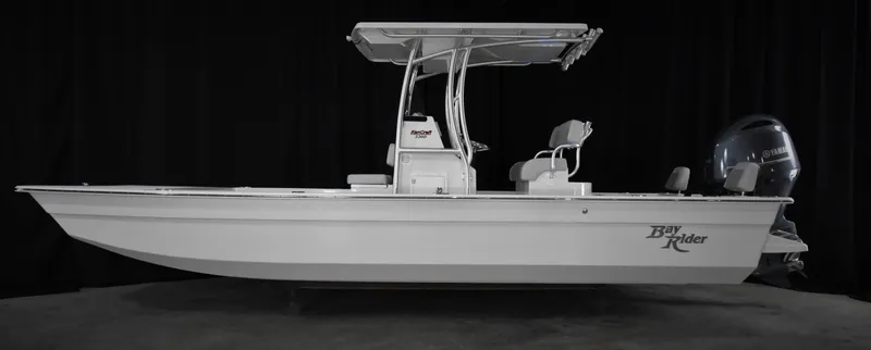 Slide: The Image of 2025 KenCraft 2260 Bay Rider Skiff boat with T-top and outboard motor. - 7