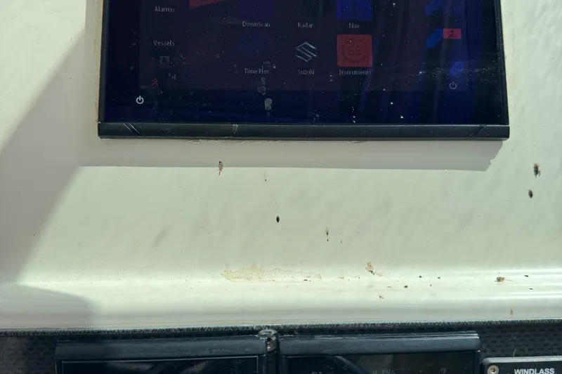 Slide: The Image of Control panel of a 2005 Hydra-Sports Vector 2500 VX boat with display screen. - 2