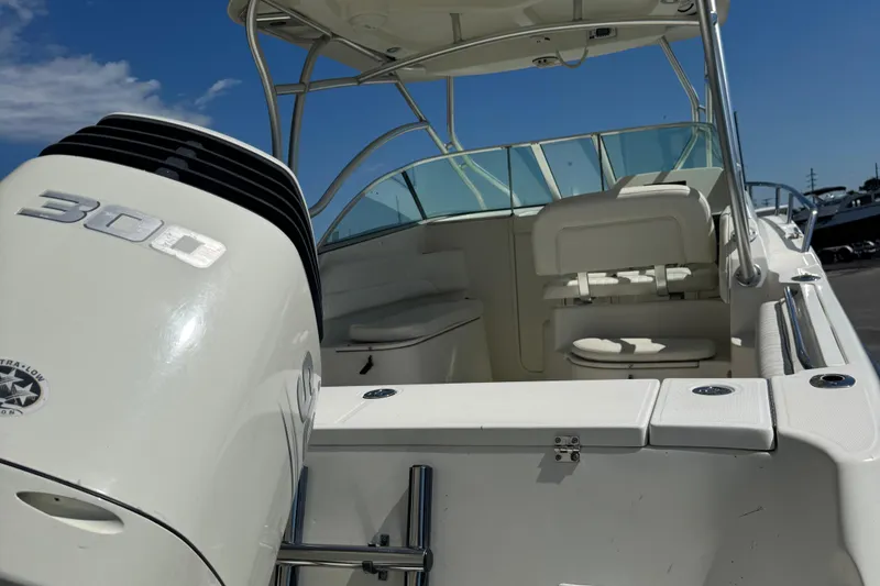 Slide: The Image of 2005 Hydra-Sports Vector 2500 VX boat with powerful 300 engine, sleek design, and spacious seating. - 3