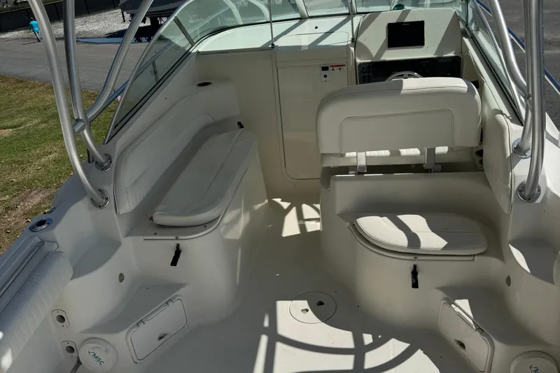 Slide: The Image of 2005 Hydra-Sports Vector 2500 VX boat interior with seating and control panel. - 4