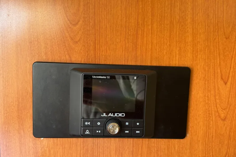 Slide: The Image of JL Audio MediaMaster 50 installed on 2005 Hydra-Sports Vector 2500 VX boat. - 7