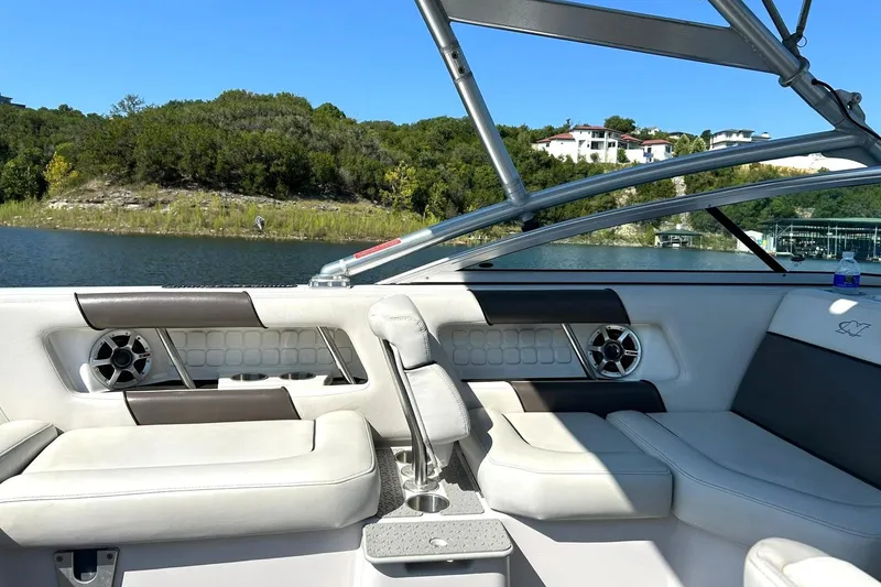 Slide: The Image of 2008 Air Nautique Crossover 236 boat interior with lake and hillside view. - 33