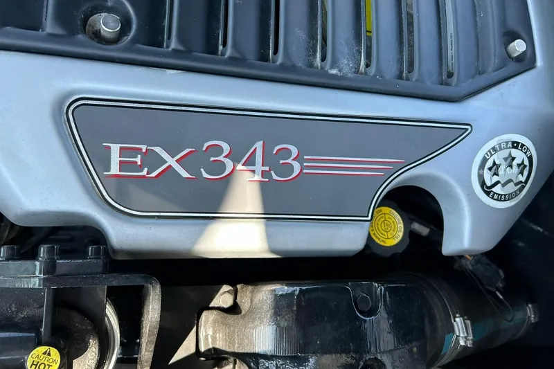 Slide: The Image of 2008 Air Nautique Crossover 236 engine detail with EX343 and ultra-low emission label. - 48