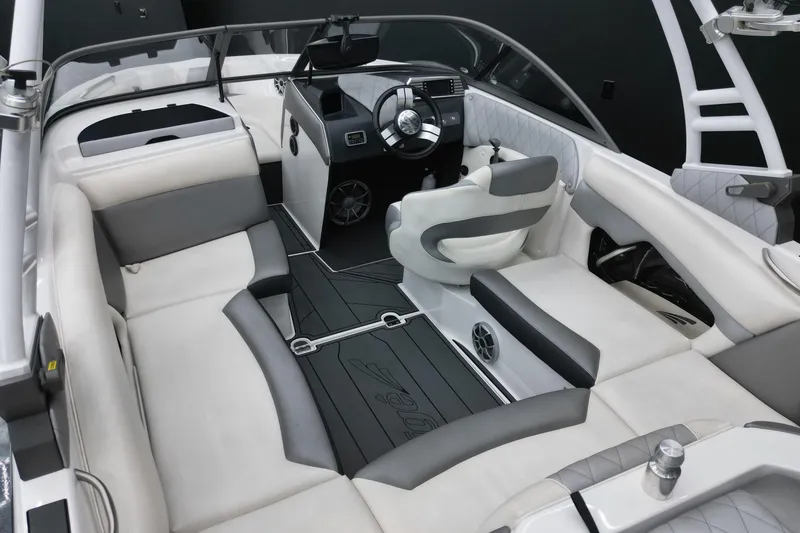 Slide: The Image of 2016 Tigé R20 boat interior with sleek seating and modern dashboard design. - 10