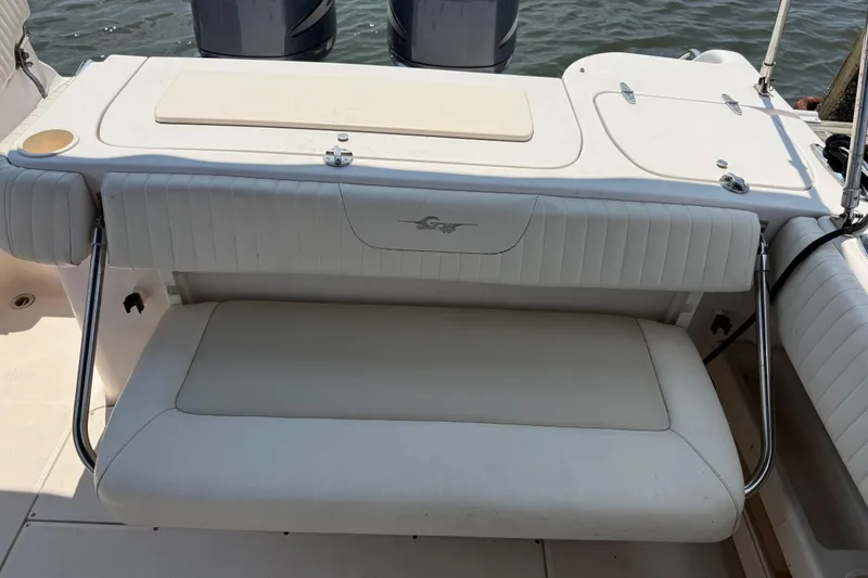 Slide: The Image of 2008 Grady-White Tournament 275 boat dashboard with Garmin navigation system and Yamaha controls. - 23