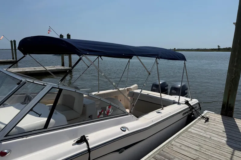 Slide: The Image of 2008 Grady-White Tournament 275 boat on trailer under cloudy sky. - 8